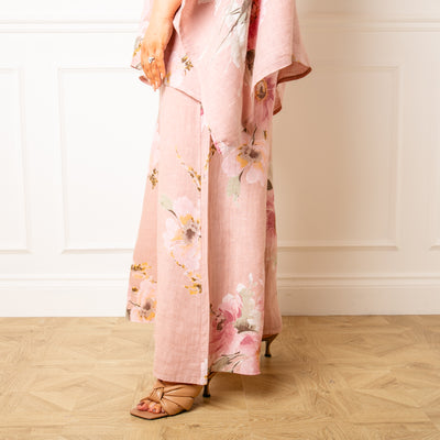The dusky pink Bouquet Print Linen Trousers featuring a large beautiful floral print perfect for summer