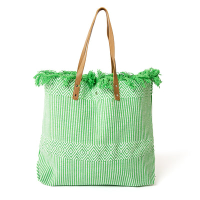 The Woven Beach Bag in green with a fun aztec and striped pattern, perfect for summer